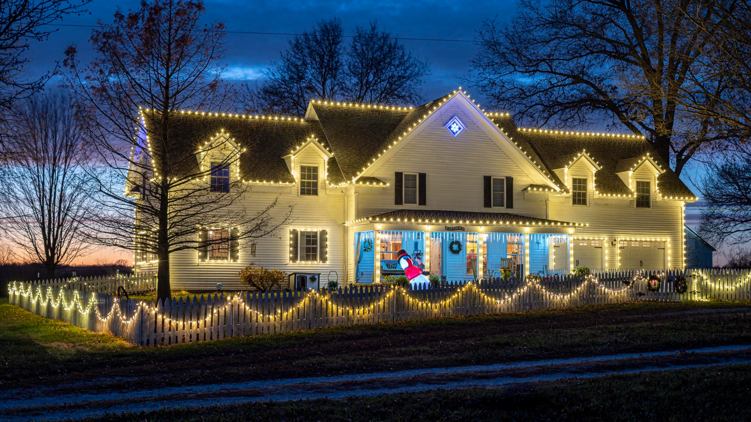 Christmas lights on windows and railings